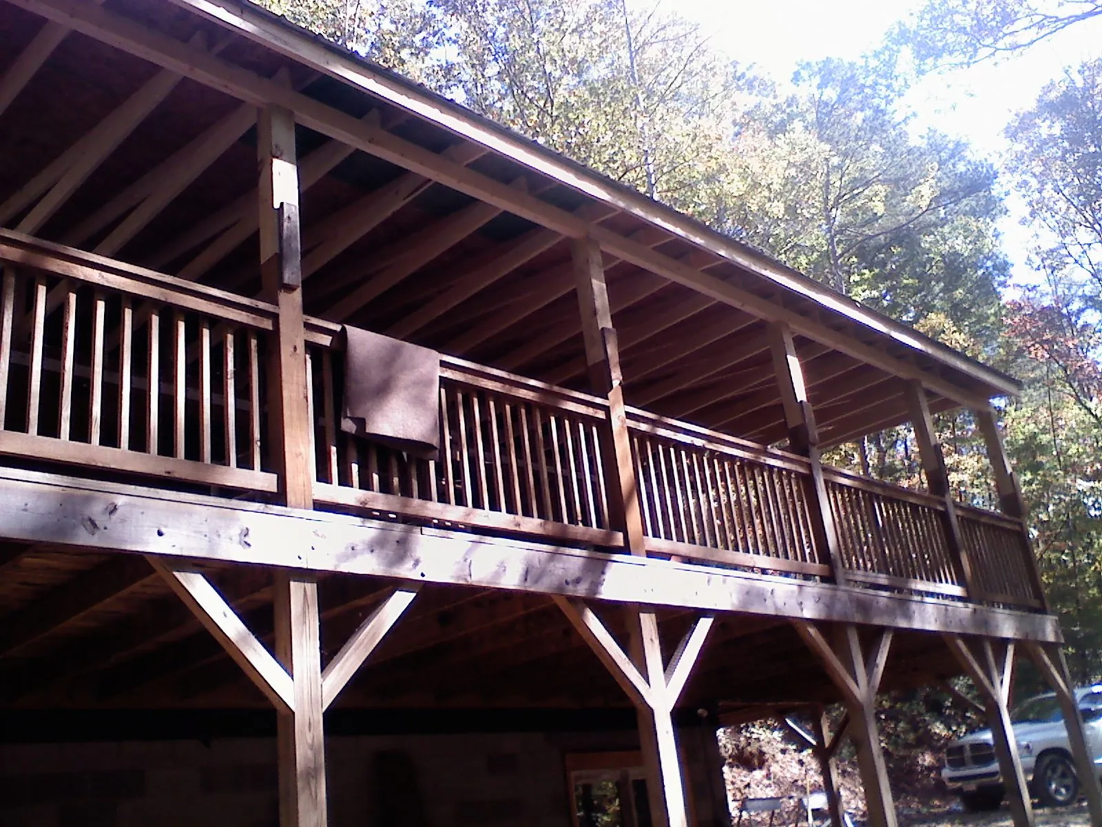 Timber framing under a new elevated porch and deck — Roof Leak Repair in Monitor by Roofing Brothers